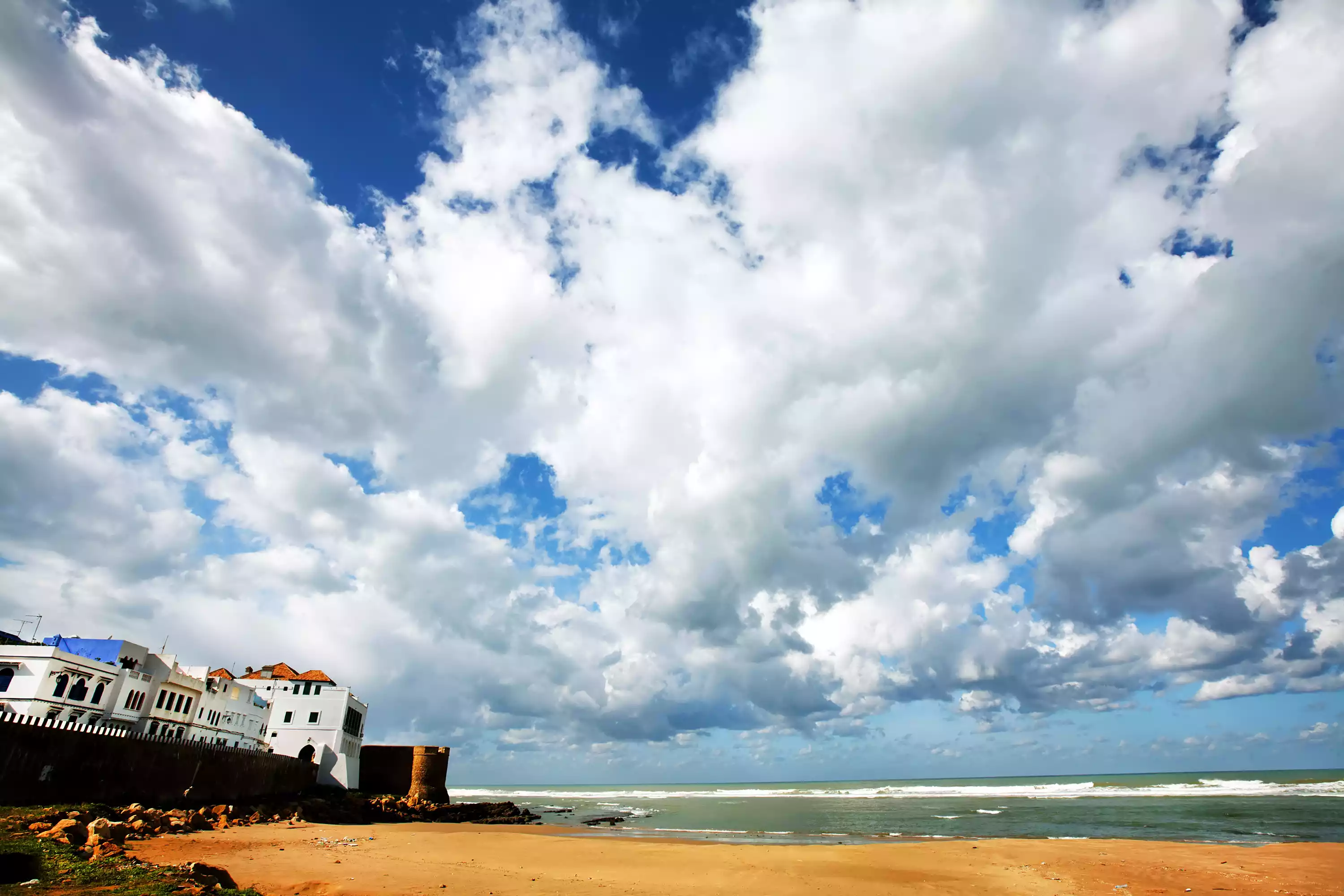 scenic-view-of-beach-against-cloudy-sky-at-asilah-746124095-5c2d2be046e0fb000192ca75